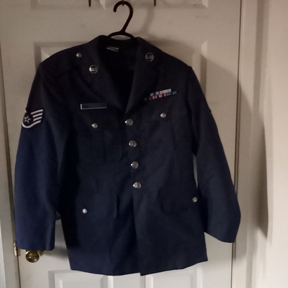 Air force military jacket with pins and patches also comes with cap